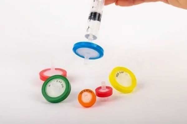 scientist-demonstrating-use-needle-tip-600w-2135829981-transformed